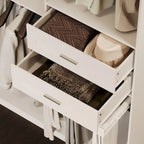 Armoire d'angle avec 2 tringles, un porte-pantalons et un rangement à chaussures